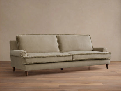 Front view of the beige McKinley Sofa with rolled arms and frayed trim, featuring two back and seat cushions.