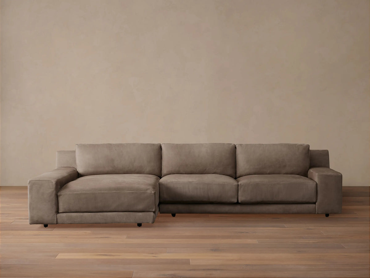 Novoli Nubuck Leather Two-Piece Chaise Sectional, muted taupe, with a left-facing chaise on a wood floor.