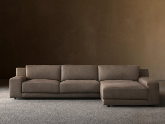 Novoli Nubuck Leather Two-Piece Chaise Sectional, muted taupe, with a left-facing chaise on a wood floor.