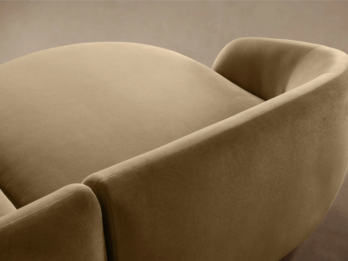 Fresno Two-Piece Chaise Sectional, golden-olive. Modern curved design, with rounded chaise on left and sofa.