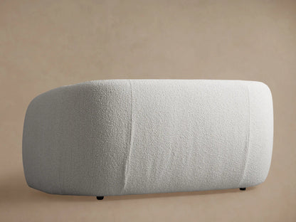 Close-up of the off-white textured fabric on the arm and back of the Fresno Sofa.