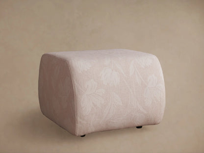Front-side view of a beige, brown, and grey woven checkerboard patterned Fresno Ottoman with soft corners.