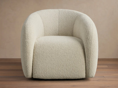 Front view of the cream boucle Fresno Swivel Glider with a curved back and arms.