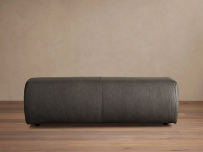 Fresno Leather Bench in dark brown leather, rectangular shape, smooth finish, positioned against a neutral wall on wooden floor.