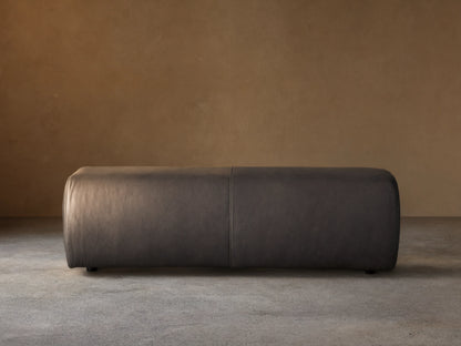 Fresno Leather Bench in dark brown leather, rectangular shape, smooth finish, positioned against a neutral wall on wooden floor.