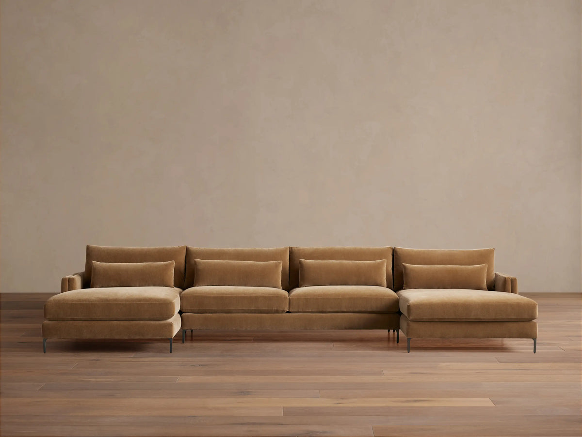 Sumner Three-Piece Double Chaise Sectional in light brown fabric, featuring a modern design with five cushions and slim metal legs.