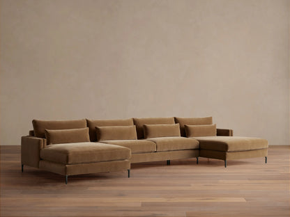 Sumner Three-Piece Double Chaise Sectional in light brown fabric, featuring a modern design with five cushions and slim metal legs.
