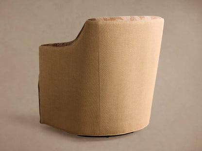 Close-up of Savannah Swivel Chair; beige textured fabric with brown floral & leaf pattern on plush seat, armrest, and back.