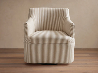 Upholstered Savannah Swivel Chair in light beige fabric with thin grey vertical stripes, angled on wood floor.