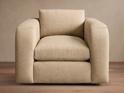 Front view of a beige Stiles Swivel Chair with rounded arms, a loose back cushion, and textured upholstery.