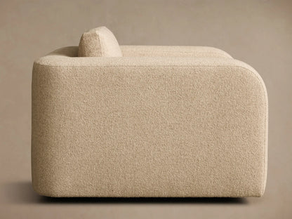 Front view of the beige textured Stiles Swivel Chair, featuring wide arms and separate seat and back cushions.