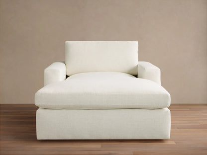 Front view of Cream Plush Chaise Lounge, featuring deep cushions and wide square arms.