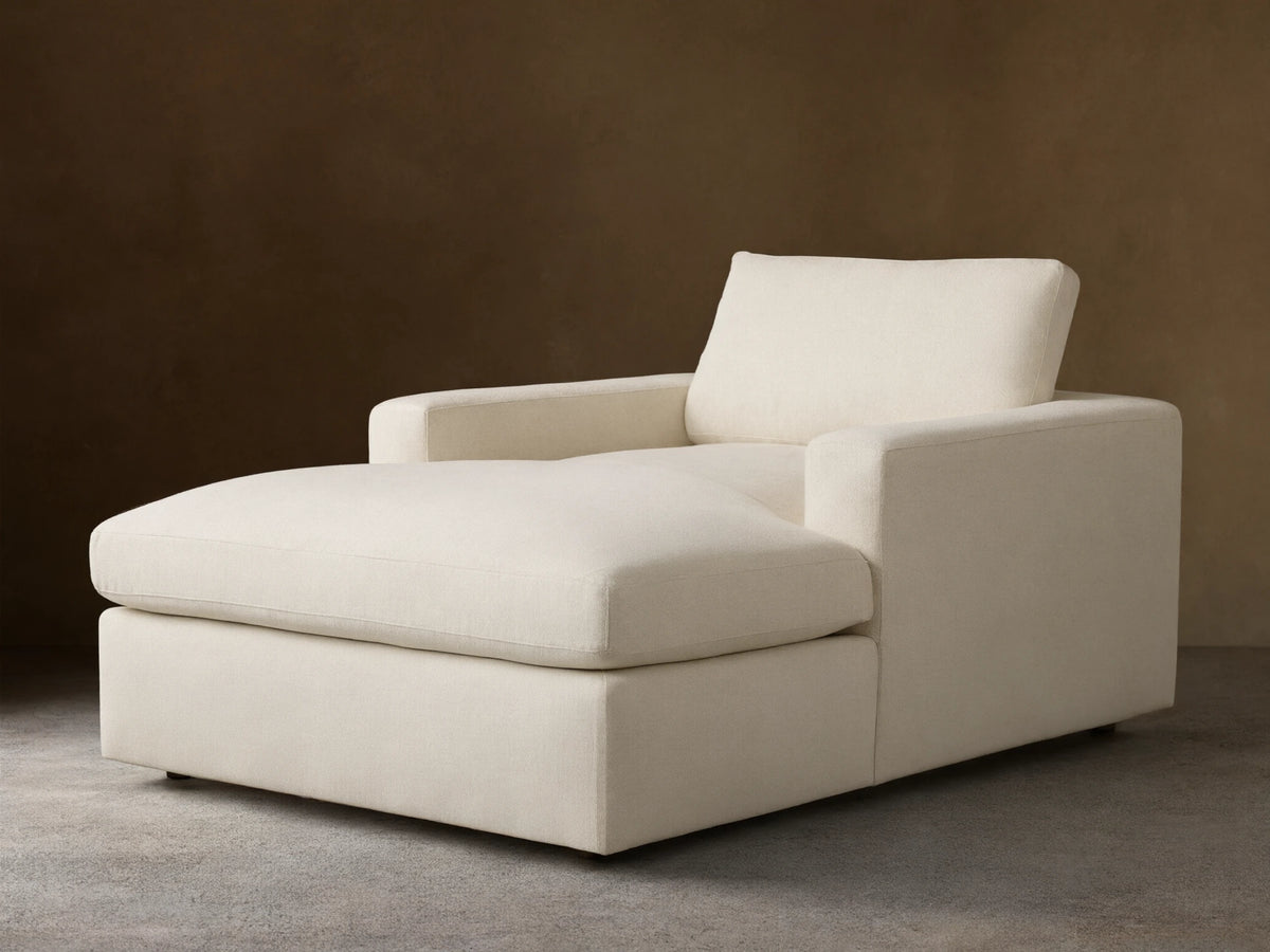 Front view of Cream Plush Chaise Lounge, featuring deep cushions and wide square arms.