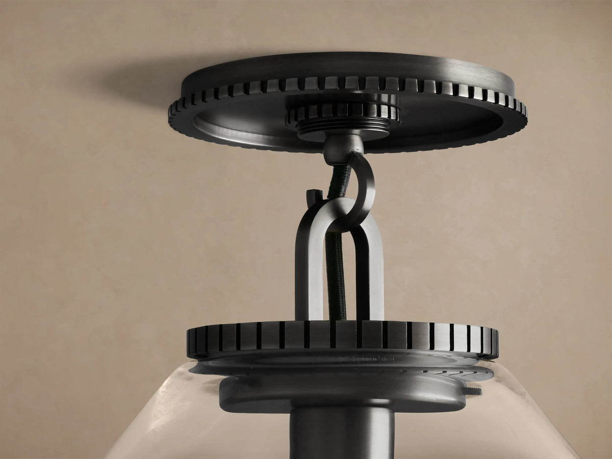 Wescott Cone Flush Mount: dark metal fixture with ridged canopy, clear glass cone shade, and visible filament bulb.